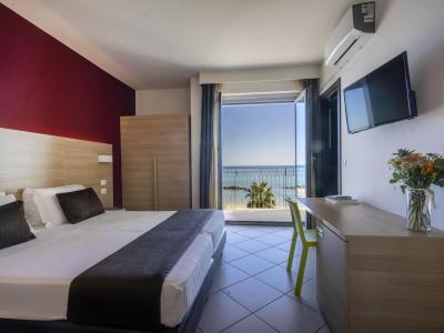 Modern room with sea view, elegant decor.