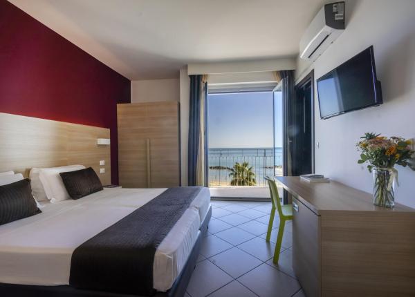 Modern room with sea view, elegant decor.